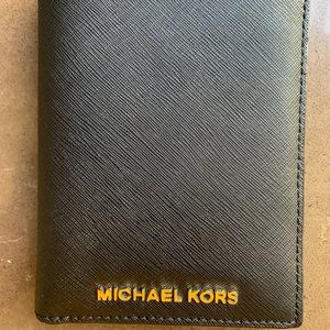 Michael Kors Womens Wallet, black with gold letters.